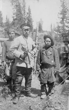 Topographer, a Member of the Land-Management Expedition with the Village Headman, 1913. Creator: GI Ivanov