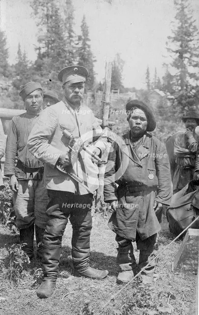 Topographer, a Member of the Land-Management Expedition with the Village Headman, 1913. Creator: GI Ivanov.