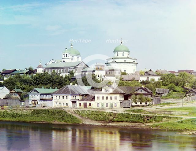 Torzhok, embankment of the river Tvertsa. In the distance, the Resurrection Monastery, 1910. Creator: Sergey Mikhaylovich Prokudin-Gorsky.