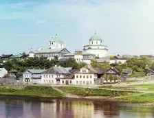 Torzhok, embankment of the river Tvertsa. In the distance, the Resurrection Monastery, 1910. Creator: Sergey Mikhaylovich Prokudin-Gorsky