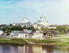 Torzhok, embankment of the river Tvertsa. In the distance, the Resurrection Monastery, 1910. Creator: Sergey Mikhaylovich Prokudin-Gorsky