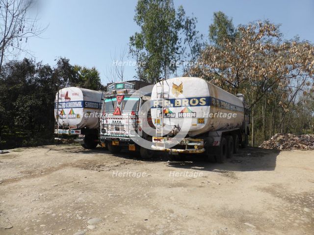 Tata trucks with heavy loads, India. Creator: Unknown.
