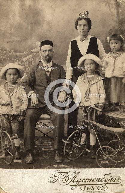 Tatar family of an employee of the office of Irkutsk merchants Shafigulins G.M. Muratov..., 1915. Creator: N. Z. Lustenberg.