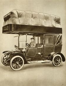 Taxi cab with gas-bag device on specially fitted roof, 1914-1918, (1935). Creator: Unknown
