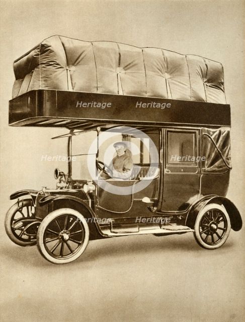 Taxi cab with gas-bag device on specially fitted roof, 1914-1918, (1935). Creator: Unknown.