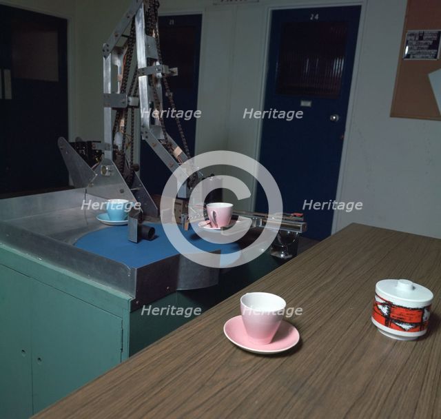 Table-clearing robot. Artist: Meredith Thring