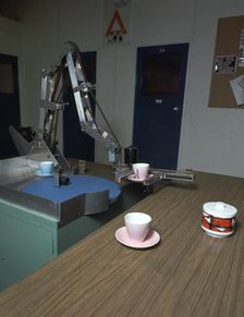 Table-clearing robot. Artist: Meredith Thring