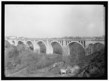 Taft Memorial Bridge, Rock Creek Park, between 1911 and 1920. Creator: Harris & Ewing