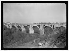 Taft Memorial Bridge, Rock Creek Park, between 1911 and 1920. Creator: Harris & Ewing