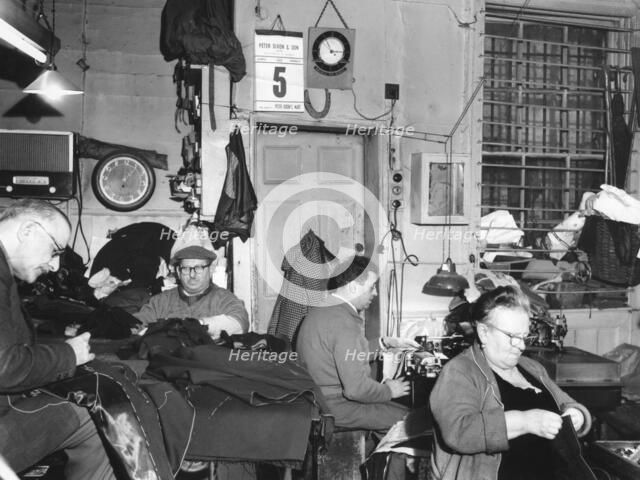 Tailor's workshop, Whitechapel, London, (c1960?) Artist: EH Emanuel