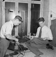 Tailors sewing and ironing, Landskrona, Sweden 1952. Creator: Unknown