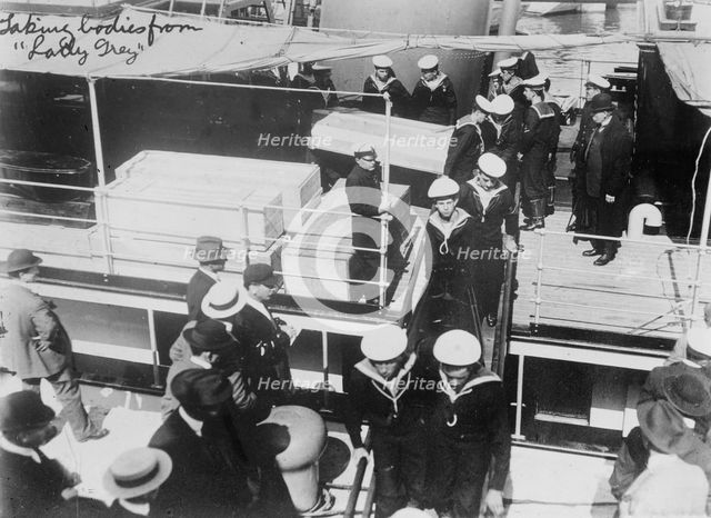 Taking bodies from LADY GREY, 1914. Creator: Bain News Service.
