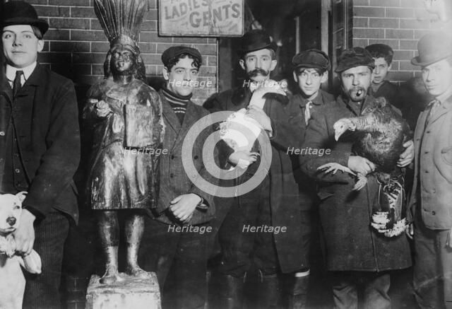 Taking home geese won at raffle, Xmas, 1910. Creator: Bain News Service.