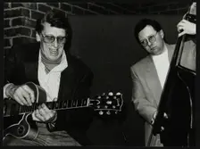 Tal Farlow and Leon Clayton playing at The Fairway, Welwyn Garden City, Hertfordshire, 1992. Creator: Denis Williams