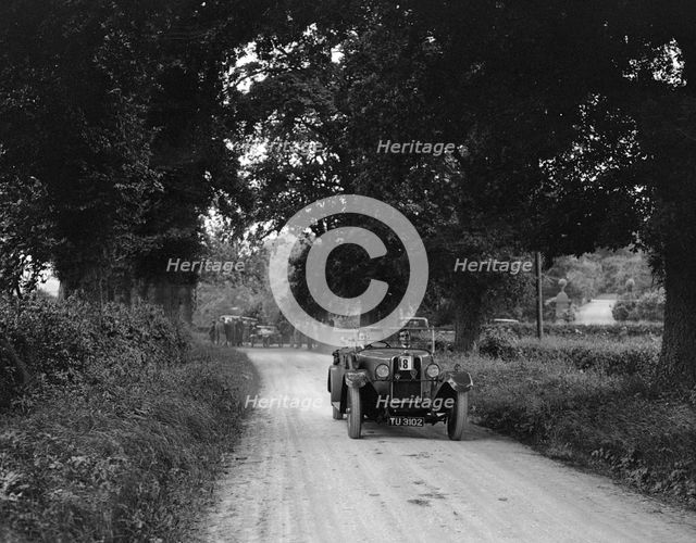 Talbot 18/55 4-seater tourer competing in the JCC Inter-Centre Rally, 1932. Artist: Bill Brunell.