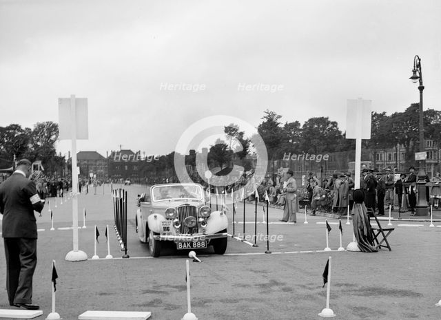 Talbot 10 drophead coupe of RM Proctor competing in the South Wales Auto Club Welsh Rally, 1937 Artist: Bill Brunell.