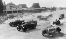 Talbot 105 tourer, Bentley and Lagonda racing at a MCC meeting, Brooklands, Surrey, 1933. Artist: Bill Brunell