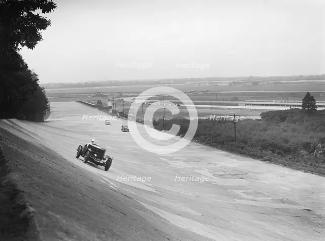 Talbot 95 Special of GA Wooding racing on the banking at Brooklands, 1938 or 1939. Artist: Bill Brunell.