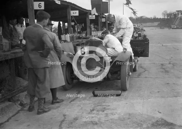 Talbot 90 of E and SJ Burt in the pits at the JCC Double Twelve race, Brooklands,  May 1931. Artist: Bill Brunell.