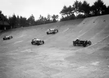 Talbot, Lagonda and Invicta racing on the Members Banking at Brooklands. Artist: Bill Brunell