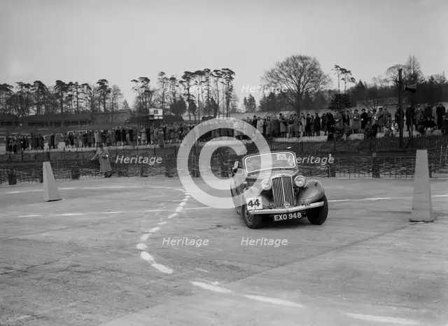 Talbot saloon competing in the JCC Rally, Brooklands, Surrey, 1939. Artist: Bill Brunell.