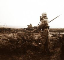 Tank and soldier on battlefield, c1914-c1918