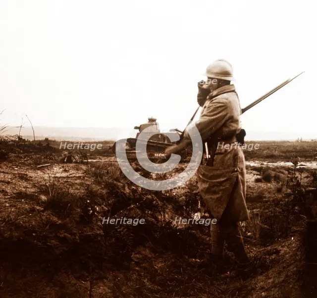 Tank and soldier on battlefield, c1914-c1918. Artist: Unknown.