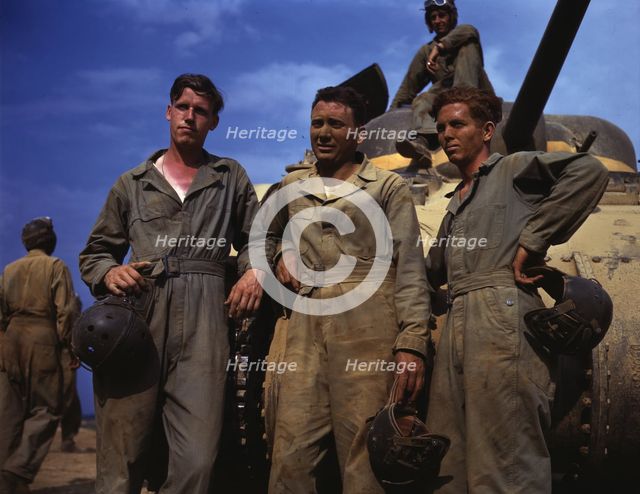 Tank crew standing in front of M-4 tank, Ft. Knox, Ky., 1942. Creator: Alfred T Palmer.
