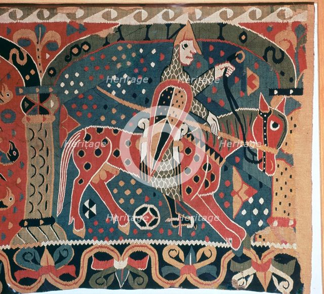 Tapestry fragment showing a Viking horseman. Artist: Unknown