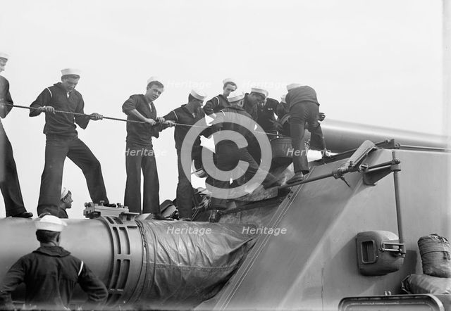 Target Practice - Cleaning 12' Gun, 1913. Creator: Unknown.