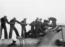 Target Practice - Cleaning 12 Gun, 1913. Creator: Unknown