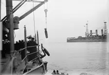Target Practice - Hauling Torpedoes On Board, 1913. Creator: Unknown