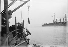 Target Practice - Hauling Torpedoes On Board, 1913. Creator: Unknown