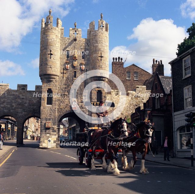 Tetley shire horses and dray in front of Micklegate Bar, York, North Yorkshire, 1969.  Artist: Michael Walters