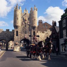 Tetley shire horses and dray in front of Micklegate Bar, York, North Yorkshire, 1969. Artist: Michael Walters