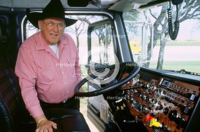 Texan Trucker in his cab 1994. Artist: Unknown.