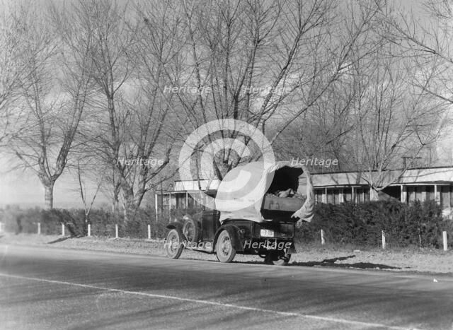 Texans earning their way westward, bound for a new start in Oregon, US 99, California, 1935. Creator: Dorothea Lange.