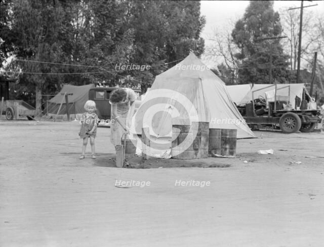 Texas drought refugees in cotton camp near Exeter, California, 1936. Creator: Dorothea Lange.