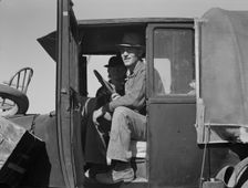 Texas family looking for work in the carrot harvest, California, 1937. Creator: Dorothea Lange