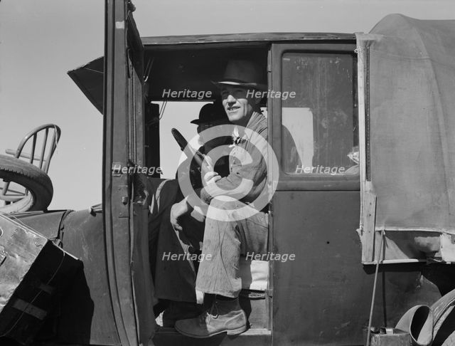 Texas family looking for work in the carrot harvest, California, 1937. Creator: Dorothea Lange.