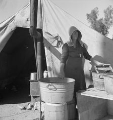 Texas woman in carrot pullers camp, Imperial Valley, California, 1939. Creator: Dorothea Lange