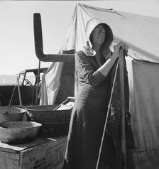 Texas woman in carrot pullers camp, Imperial Valley, California , 1939. Creator: Dorothea Lange