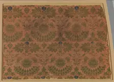 Textile with Lions Heads, Foliate Ornament and Kufic Letter L, Italian, 14th century. Creator: Unknown