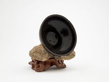 Tea bowl encrusted with sea shells, date unknown. Creator: Unknown