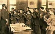 Teacher with students in a dictation class (1910)