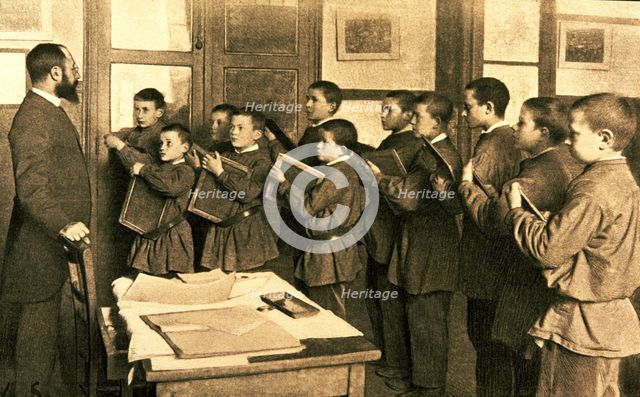 Teacher with students in a dictation class (1910).