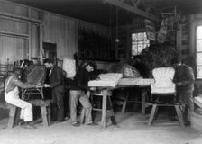Teacher and four students making furniture at Hampton Institute, Hampton, Va., 1899 or 1900. Creator: Frances Benjamin Johnston