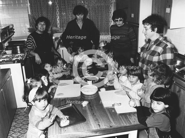 Teacher Janet Lawson demonstrates kichal baking, Gan Yeladim Synagogue kitchen, Reading, 1987. Artist: Unknown