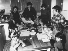 Teacher Janet Lawson demonstrates kichal baking, Gan Yeladim Synagogue kitchen, Reading, 1987