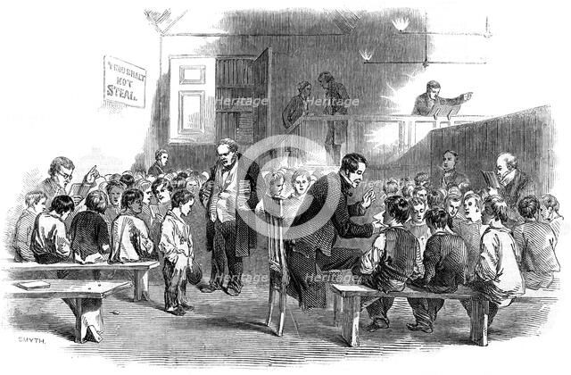 Teaching boys to read in the Ragged School Union school, Lambeth, London, 1868. Artist: Unknown